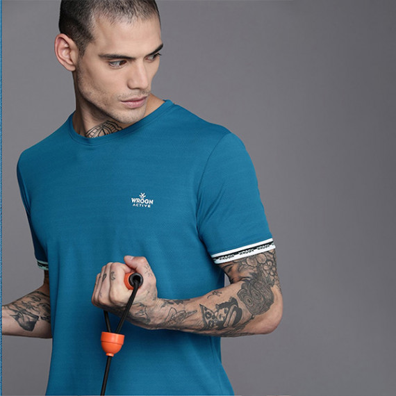 https://www.fineclothes.in/products/men-teal-blue-brand-logo-printed-casual-t-shirt