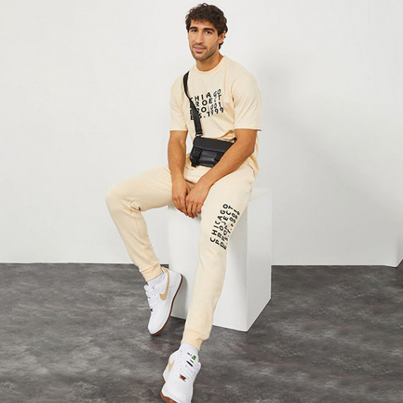 https://www.fineclothes.in/products/men-cream-colored-solid-slim-fit-cotton-joggers